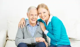 Caregiver with her old patient