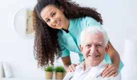 Caregiver with her old patient