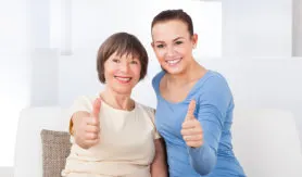 Old woman with her caregiver