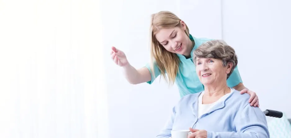 Caregiver with her old patient